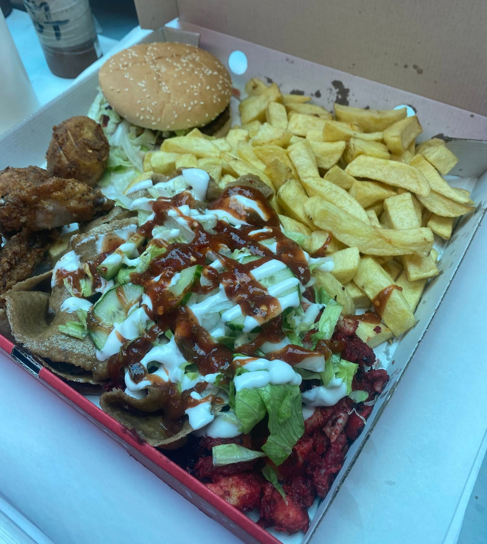 Tray of chips, burger, kebab meat and salad from Sunny's Fish Bar